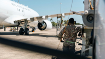  Logistics Driver performs a refuel on a Royal Australian Air Force E-7A Wedgetail Airborne Early Warning and Control aircraft