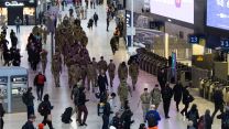 Thousands of serving personnel, cadets, and veterans took over London's railway and underground stations 