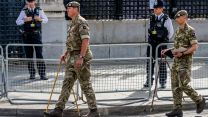  Senior Guards Warrant Officers measure out the area, with pace sticks, in advance of the State Funeral for Queen Elizabeth