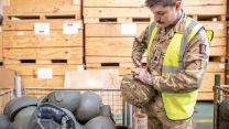 2nd Battalion The Royal Anglian Regiment cuts ties of helmet to prepare it for packaging MOD Donnington bound for Ukraine 31032022 CREDIT MOD CROWN COPYRIGHT.jpg
