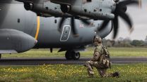 2nd Battalion The Royal Gurkha Rifles takes a knee behind a Royal Air Force A400M 28042023 CREDIT MOD Crown Copy.jpg