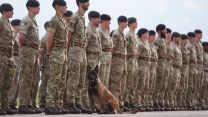 Rikki lines up with soldiers to greet the Princess Royal during her visit to Kendrew Barracks (Picture: PA)