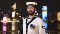 One of HMS Spey's guard stands smartly to attention on the patrol ships flight deck during a reception pic MOD