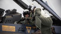Gen Sir Gwyn receives pre flight checks from the Commanding Officer of Strike Fighter Squadron 213, Cmdr Kevin Swift