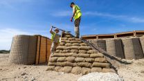 Personnel from the Royal Engineers operate under the intense Cyprus sun, carrying out essential construction and engineering tasks in support of British forces