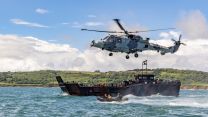 An 847 NAS Wildcat hovers during Royal Marines' raiding team training in July (Picture: Royal Navy). 847 NAS Wildcat hovers during Royal Marines' raiding team training in July 19072021 Credit Navy.jpg
