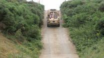 A British Army Jackal Patrol Vehicle experimental hybrid is tested on a 30-degree slope using battery power only.
