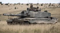 A Challenger 2 tank rolling across Salisbury Plain, Exercise IRON CYCLONE 25072023 CREDIT MOD.jpg
