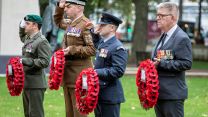 A Royal Marine Bugler played the Last Post as representatives from the services and veterans organisations laid wreaths at the Iraq and Afghanistan Memorial in London