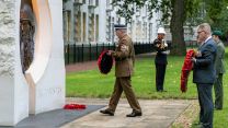 A Royal Marine Bugler played the Last Post as representatives from the services and veterans organisations laid wreaths at the Iraq and Afghanistan Memorial, London