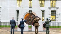 A Royal Marine Bugler played the Last Post while representatives from the services and veterans organisations laid wreaths at the Iraq and Afghanistan Memorial, London