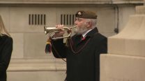 A bugler plays during the Armistice Day 2020 service at Belfast Cenotaph.