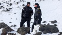 A member of the Royal Navy and a member of the Norwegian Navy on Jan Mayen 130422 CREDIT Royal Navy