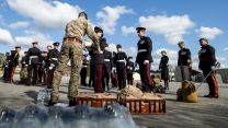 Lunches are handed out to members of the Armed Forces in Pirbright as they wait to go to London for a full dress rehearsal for the Duke of Edinburgh's funeral (Picture: MOD).