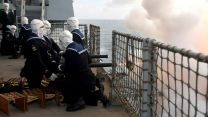 A mid action shot of a gun salute on HMS Queen Elizabeth to mark the passing of HM Queen Elizabeth II (Picture: MOD).