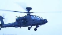 A side view of the Apache AH-64E.
