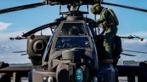 Army Air Corps Apache helicopters working with HMS Prince of Wales after joining the carrier in Portsmouth for trials (Picture: MOD).