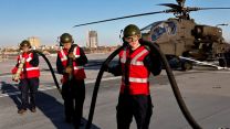 Army Air Corps Apache helicopters working with HMS Prince of Wales after joining the carrier in Portsmouth for trials (Picture: MOD).