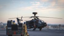 Army Air Corps Apache helicopters working with HMS Prince of Wales after joining the carrier in Portsmouth for trials (Picture: MOD).