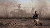 An AH64 Apache conducts dust landing (Picture: MOD). AH64 Apache conducts dust landing deployed to RAFO Musannah Ex Pinion Oman 2118102021 Credit MOD Crown.jpg