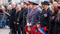 Air Officer Scotland waits from other service heads to lay a wreath at the Stone of Remembrance 