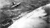 American B-26 Marauder returns to UK base, flying across the invasion on Sword beach