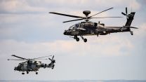 Apache (top) and Wildcat hlicopters above RAF College Cranwell 26042023 CREDIT MOD Crown Copyright