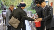 Armed Forces personnel selling poppies as part of London Poppy Appeal 
