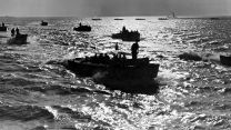 Assault landing crafts carrying Royal Marines form up in the Channel on the night of 5 June 1944, ahead of taking part in the D-Day assault the next morning 