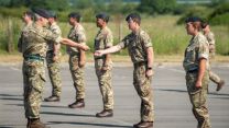 Badges 13th Signal Regiment being handed out on (Picture: MOD).