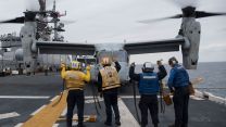Air Dept Sailors Signal For Take-Off 