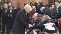Boris Johnson shakes hands with veterans on Armistice Day in Wolverhampton.