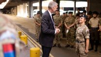 CDS Admiral Sir Tony Radakin (centre) presents Gunner Stark (right) with a CDS coin during  London Military Operations Centre visit 11092022 CREDIT MOD Crown Copyright.jpg