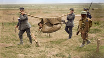 German prisoners carrying Canadian wounded (Picture: Vimy Foundation).