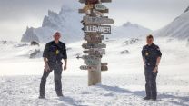 Captain Steve Higham (left) and Commander Chris L’Amie (right) stand in the snow on volcanic island of Jan Mayen in the Arctic Circle 130422 CREDIT Royal Navy