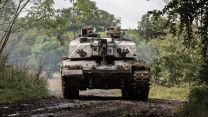 Challenger 2 tank travelling across the training area during Exercise IRON CYCLONE 28072023 CREDIT MOD.jpg