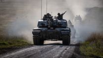 Challenger 2 tanks roll across Salisbury Plain. Exercise IRON CYCLONE 25072023 CREDIT MOD.jpg