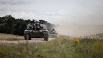 Challenger 2 tanks roll across Salisbury Plain. IRON CYCLONE 25072023 CREDIT MOD.jpg