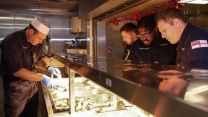 Christmas lunch on HMS Queen Elizabeth, 5 deck filled with decorations 06122021 CREDIT HMS QE Twitter.jpg