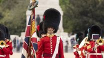 Coldstream Guards wearing Summer Guard Order military uniform scarlet and bearskin cap during Chief of Staff of US Army visit to London Whitehall 120422 CREDIT UK MOD © Crown copyright 2022