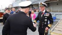 Commander Harper greets Former Second Sea Lord Vice Admiral Sir Adrian Johns HMS Severn 27082021 CREDIT Royal Navy.jpg
