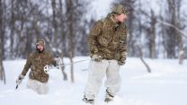 Commando Forces skiing through the trees during their Cold Weather Winter Warfare Course at Malselv, Norway