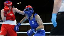 Corporal Megan Reid of Team Scotland (blue shorts) boxing in the Women's Light (57 - 60kg) at the Commonwealth Games 01082022 CREDIT MOD Crown Copyright.jpg