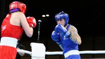 Corporal Megan Reid of Team Scotland (blue shorts) fighting in the Women's Light (57 - 60kg) at the Commonwealth Games 01082022 CREDIT MOD Crown Copyright.jpg