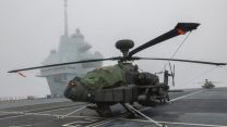 Army Air Corps Apache helicopters working with HMS Prince of Wales after joining the carrier in Portsmouth for trials (Picture: MOD).