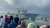 Crowds watch HMS Queen Elizabeth departing for the USA 07092022 CREDIT BFBS.JPG