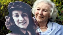 Dame Vera Lynn with life-size cutout of herself after being named personality of the century (Picture: PA).