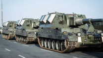 British Army Vehicles Await Loading For Estonia Deployment 