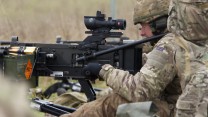 Exercise Racing Snake firing heavy machine gun 