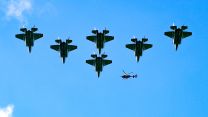 F-35B Lightning jets (with Juno helicopter) above RAF College Cranwell during rehearsal Coronation Flypast 25042023 CREDIT MOD Crown Copyright.jpg